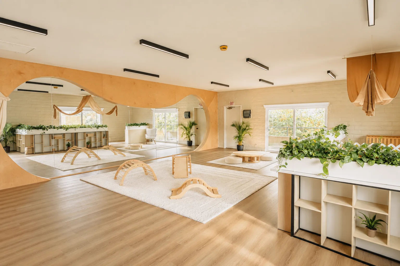 Bright mirrored studio with wood flooring and natural light at Orchard Atelier